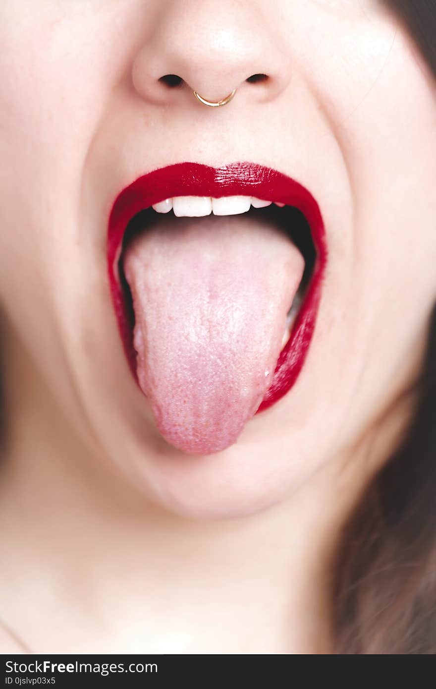 Photo of Woman Showing Her Tongue