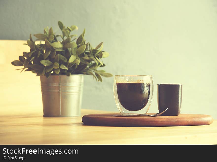 Coffee Cup On A Wooden Table And Sack Background,Vintage Color Tone