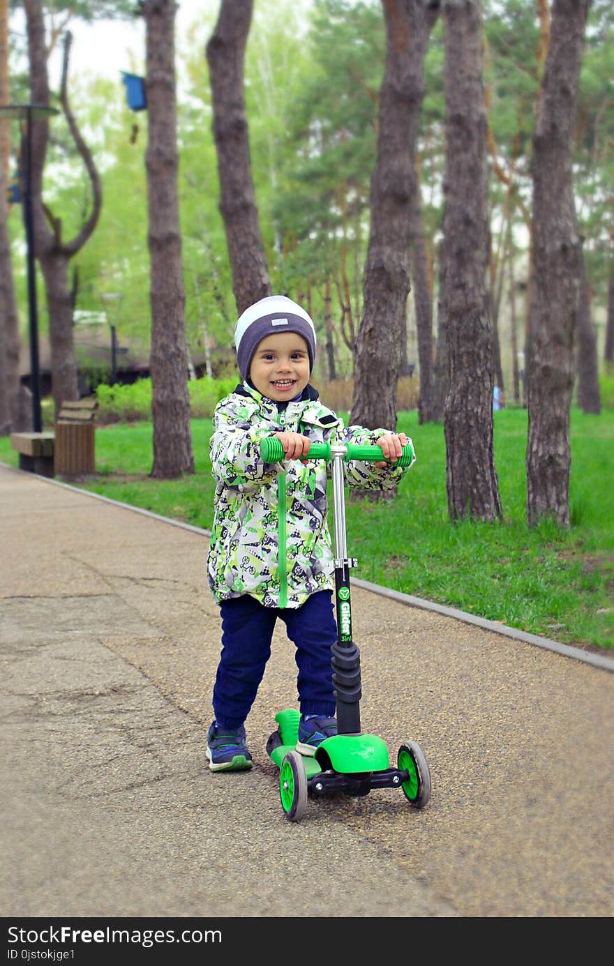 Green, Footwear, Vehicle, Public Space