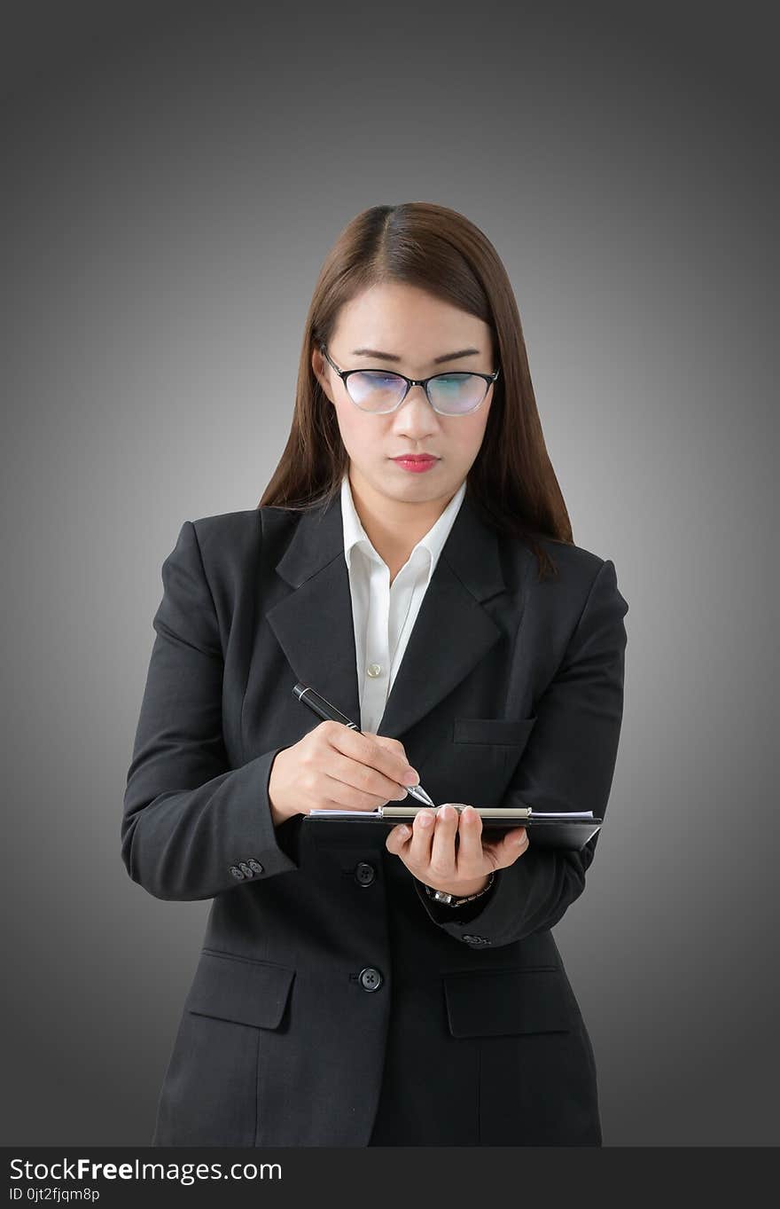 Business woman write on clipboard isolated on Gradient background from white to black with clipping path