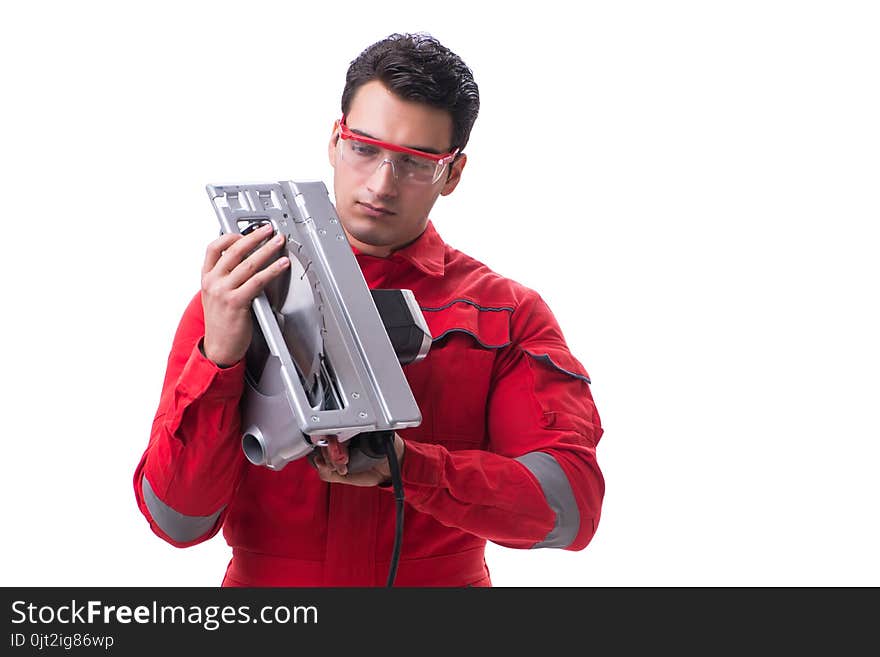 Male carpenter with circular saw in woodworking concept isolated