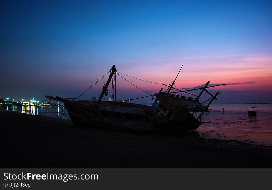 The Wreck was left on the beach with the beautiful twilight sky.