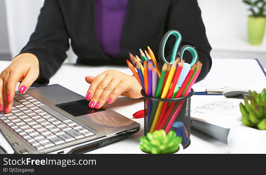 The woman behind the desk in the Office