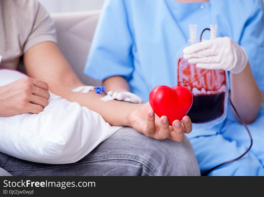 The Patient Getting Blood Transfusion In Hospital Clinic