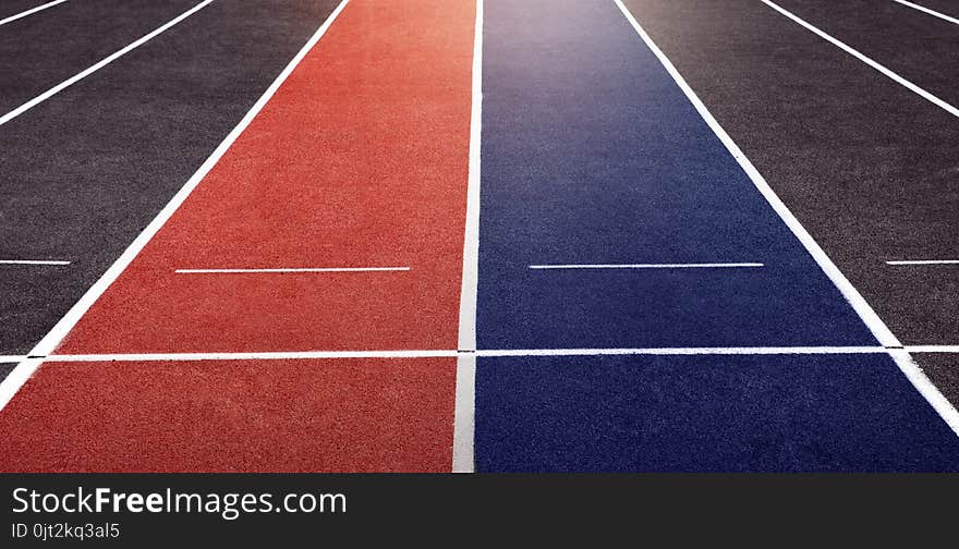 Business Competition Concept. Two Lanes of Running Track at Start Line