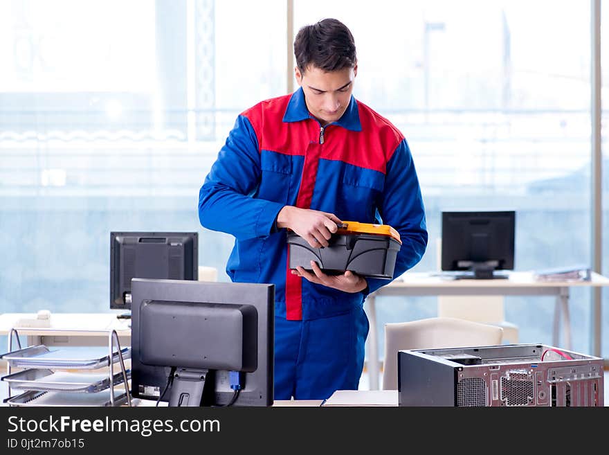 The computer repairman specialist repairing computer desktop