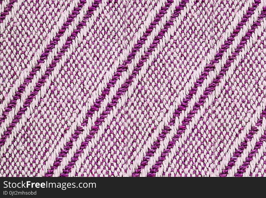 Texture of the fabric surface made of knitted natural cotton fiber, purple-lilac pattern,d