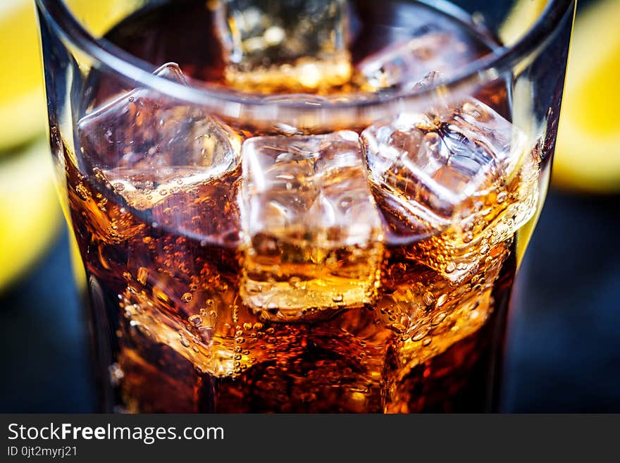 Cola with ice cubes