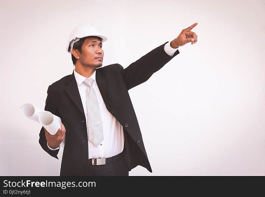 Businessman planning construction project, man