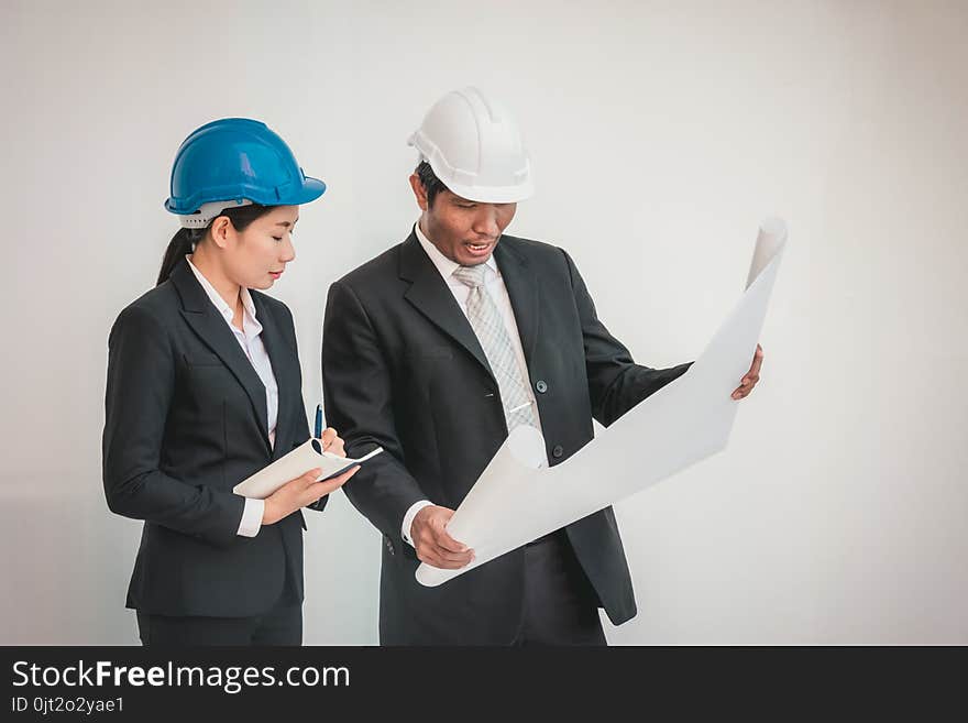 foreman architect man and woman working. teamwork