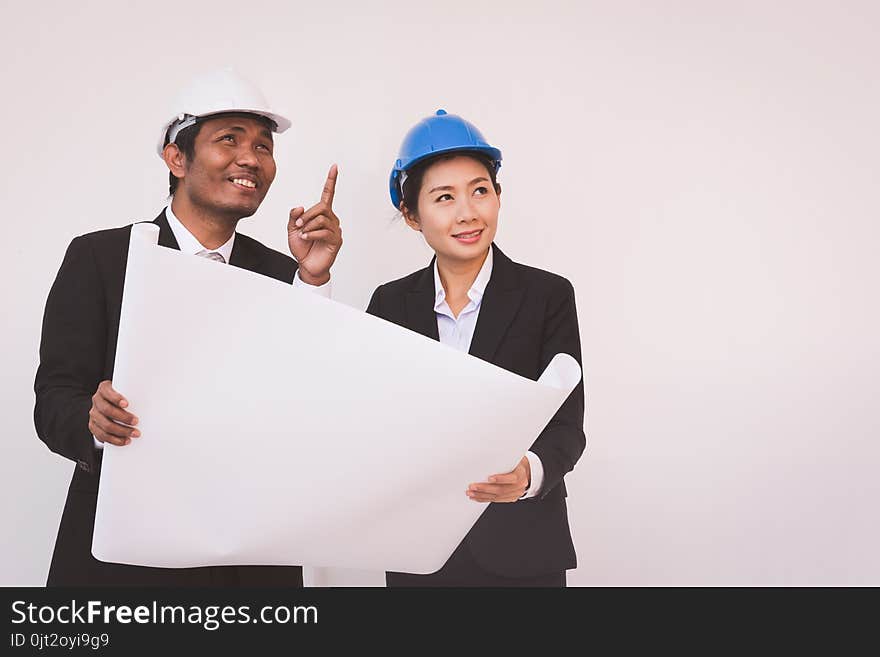 Foreman Architect Man And Woman Working.