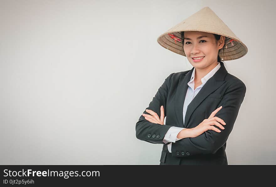 businesswoman wearing Vietnamese hat. woman asia