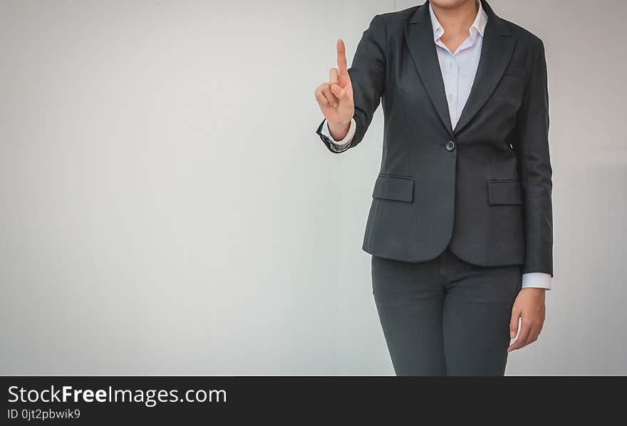 Happy Young Businesswoman With Hands Up.