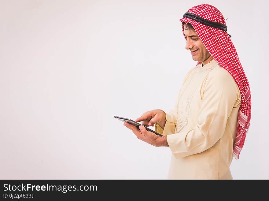 Arab Businessman Useing On A Mobile Phone