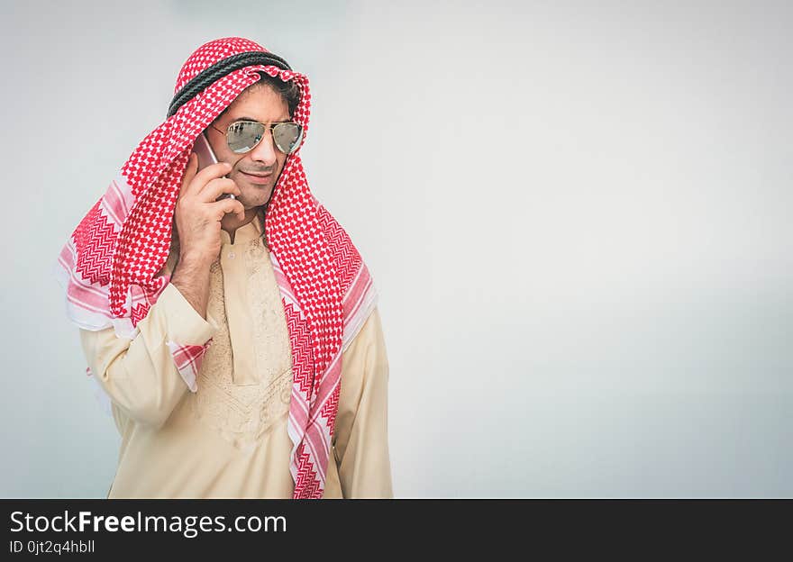 Arab Businessman Useing On A Mobile Phone