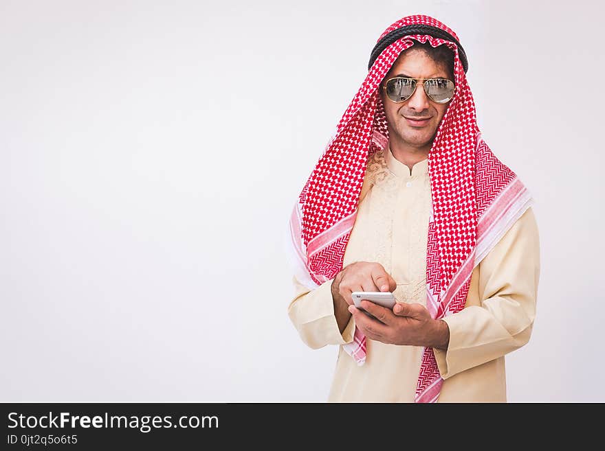 Arab Businessman Useing On A Mobile Phone