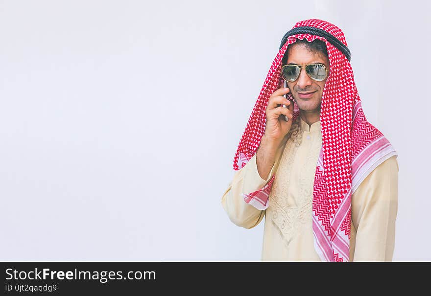 Arab Businessman Useing On A Mobile Phone