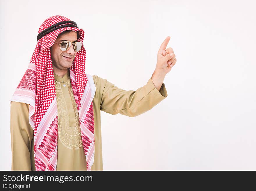 happy young Arab businessman with hands up. man