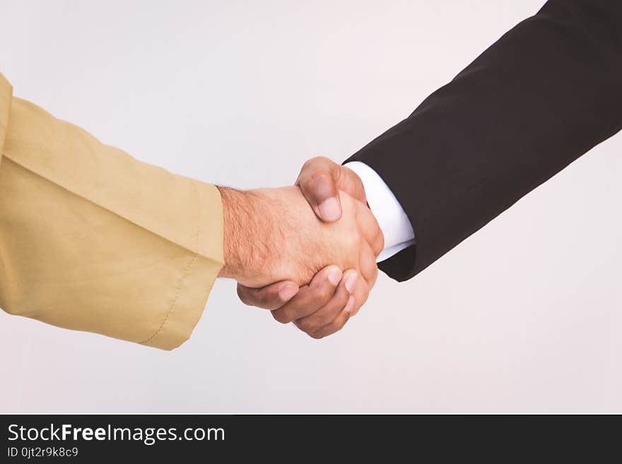 Arab businessman and businessman worker handshaking