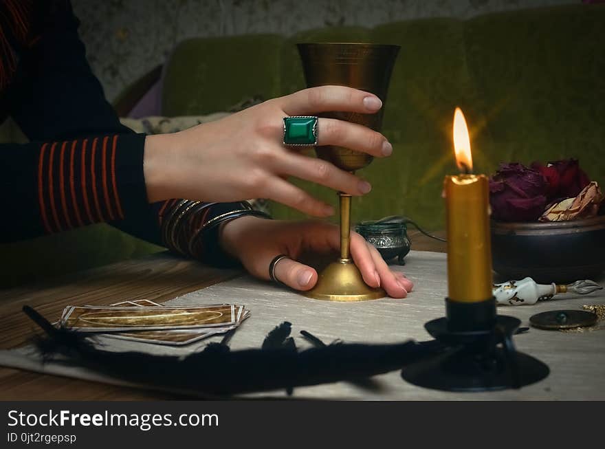 Woman witch prepare a magic potion. Tarot cards. Future reading. Fortune teller concept.