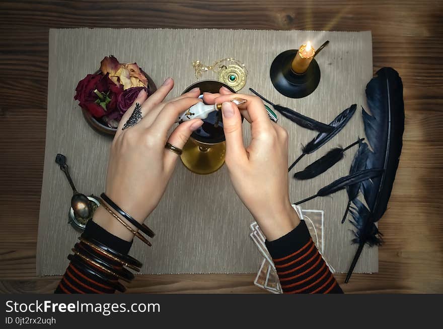 Woman witch prepare a magic potion. Tarot cards. Future reading. Fortune teller concept.