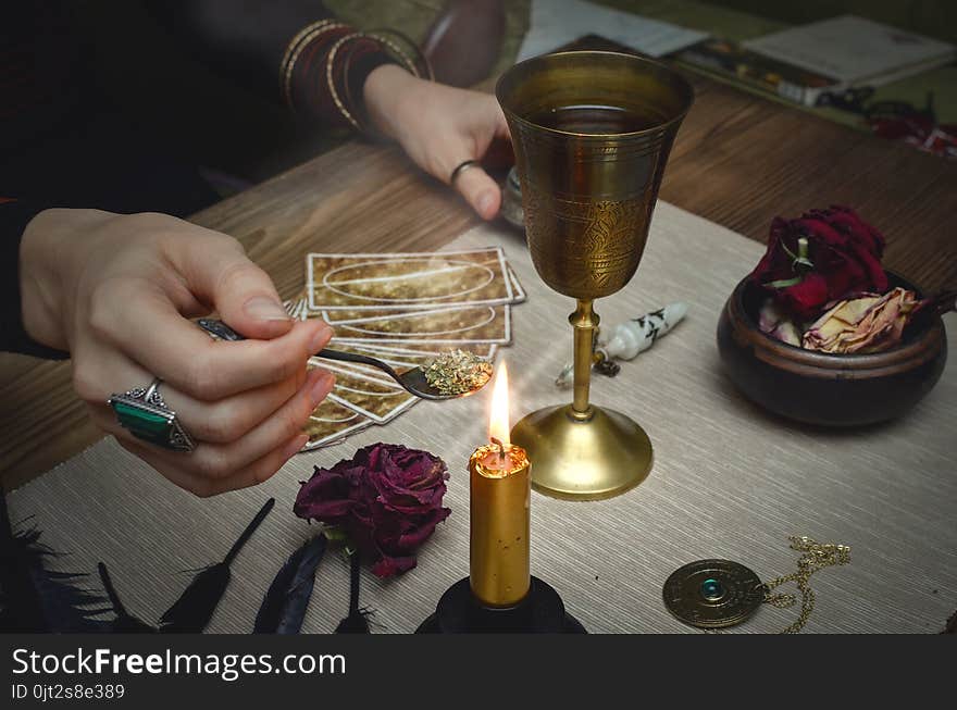 Magic potion. Tarot cards on fortune teller desk table. Future reading. Magic potion. Tarot cards on fortune teller desk table. Future reading.