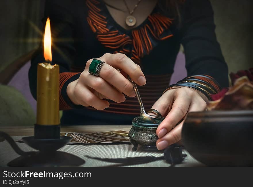 Magic potion. Tarot cards on fortune teller desk table. Future reading. Magic potion. Tarot cards on fortune teller desk table. Future reading.