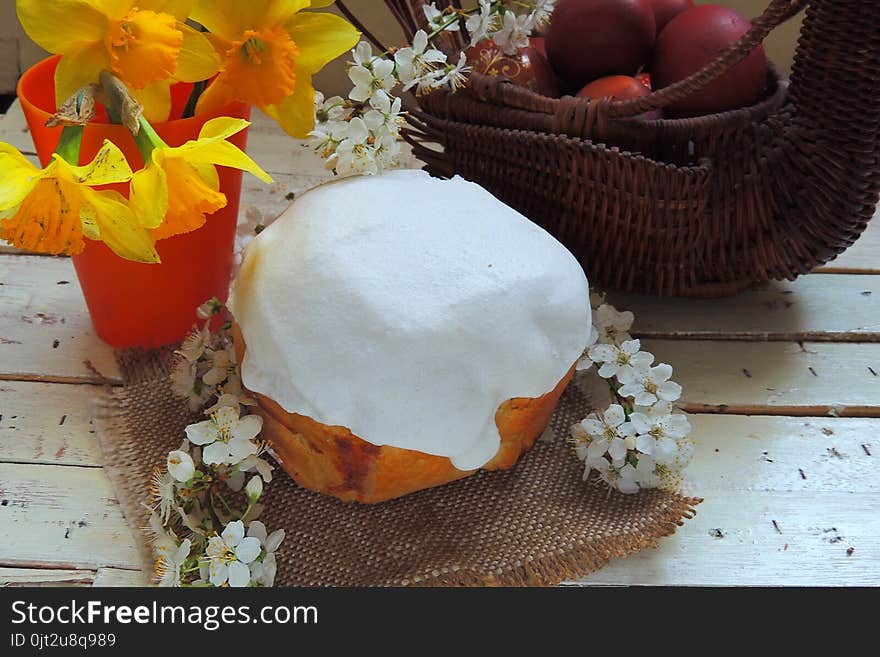 Homemade Easter cake and painted eggs on the table. Homemade Easter cake and painted eggs on the table