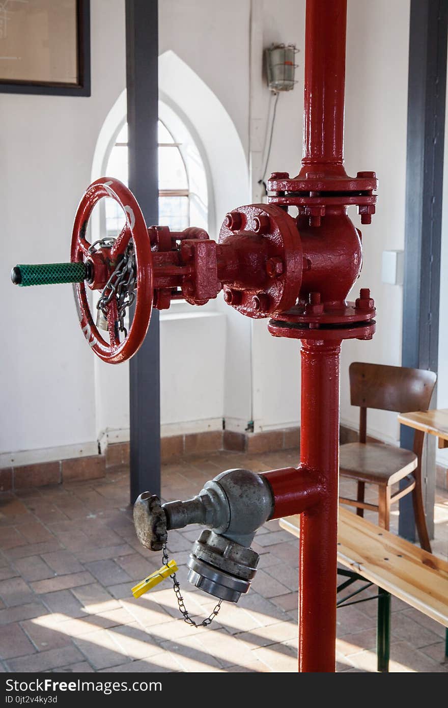 Pilsen, Czech republic - 02/21/2018: Fire tube with gate valve on the St. Barholomew`s Cathedral