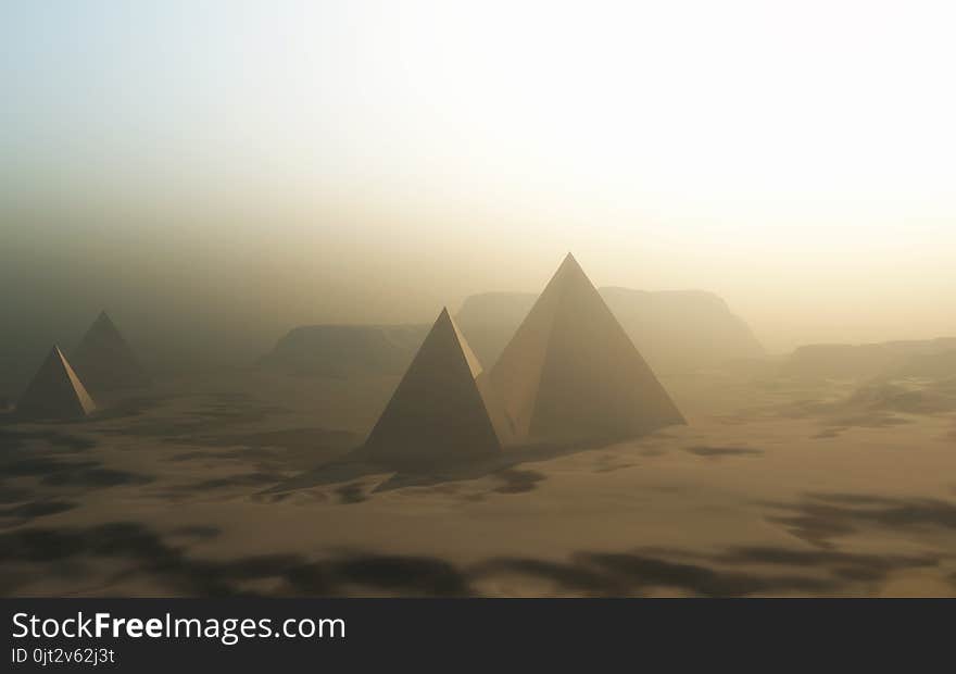 3D render of a landscape with pyramids in misty desert. 3D render of a landscape with pyramids in misty desert