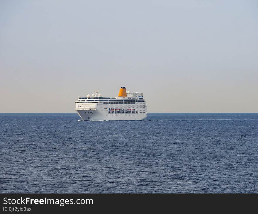 Ferryboat on the open sea at sunrise