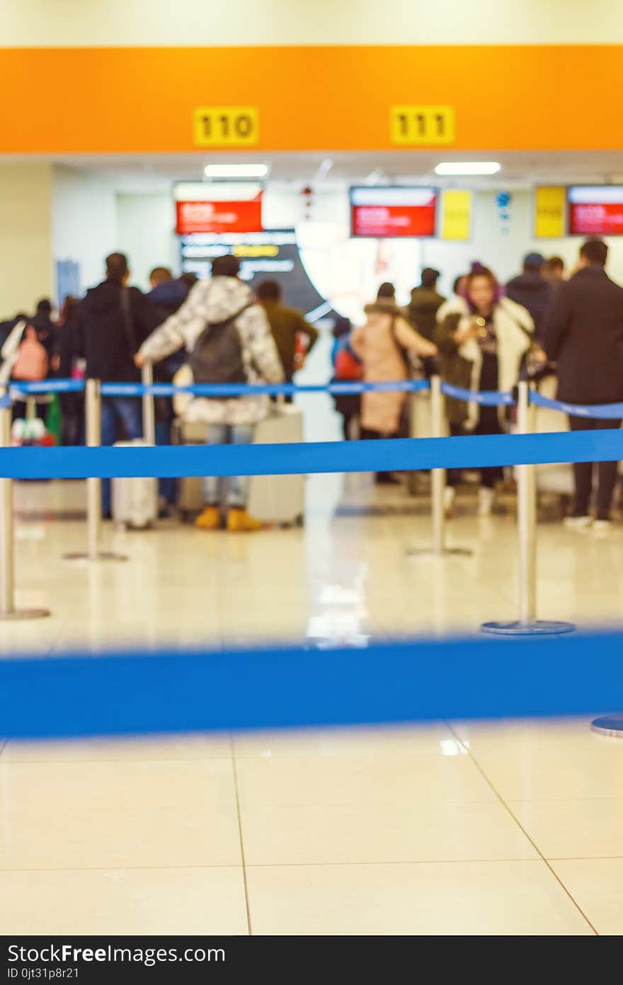 People take their luggage at the airport. Natural blur. People take their luggage at the airport. Natural blur