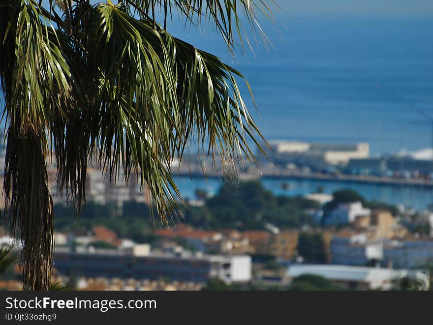 Picturesque view on Denia town, Spain. Morning view on the town from cozy balcony in Spain. Picturesque view on Denia town, Spain. Morning view on the town from cozy balcony in Spain.