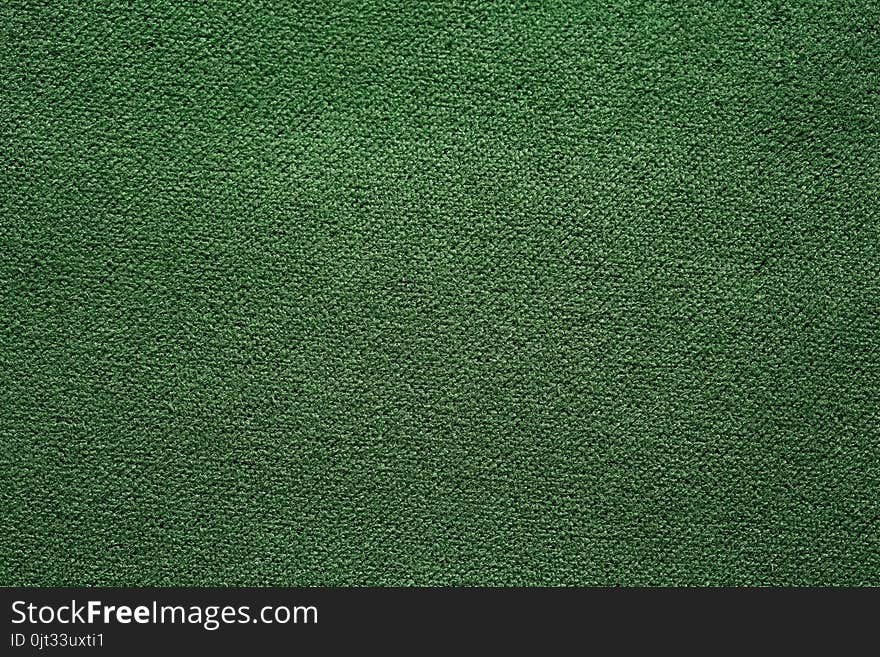 Saturated green fabric texture.