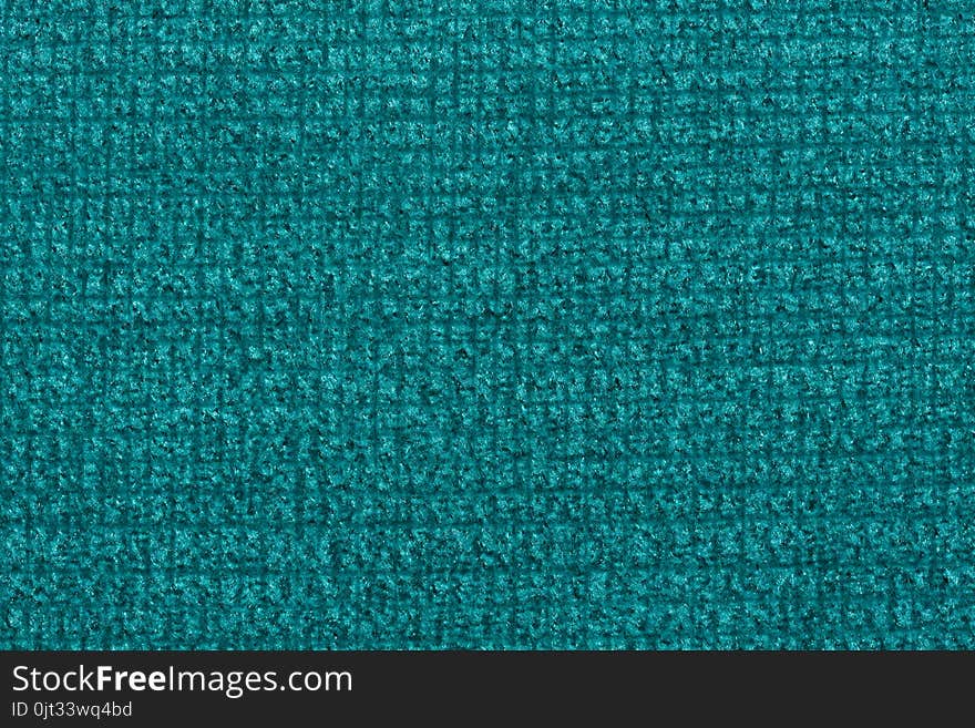 Saturated textile background in sapphirine hue. High resolution photo.