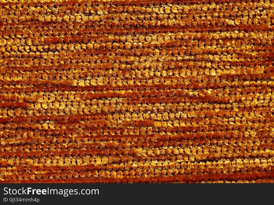 Saturated golden textile background.