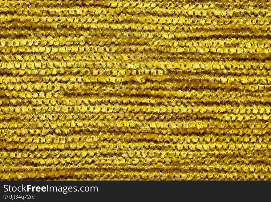 Colourful yellow textile background. High resolution photo.