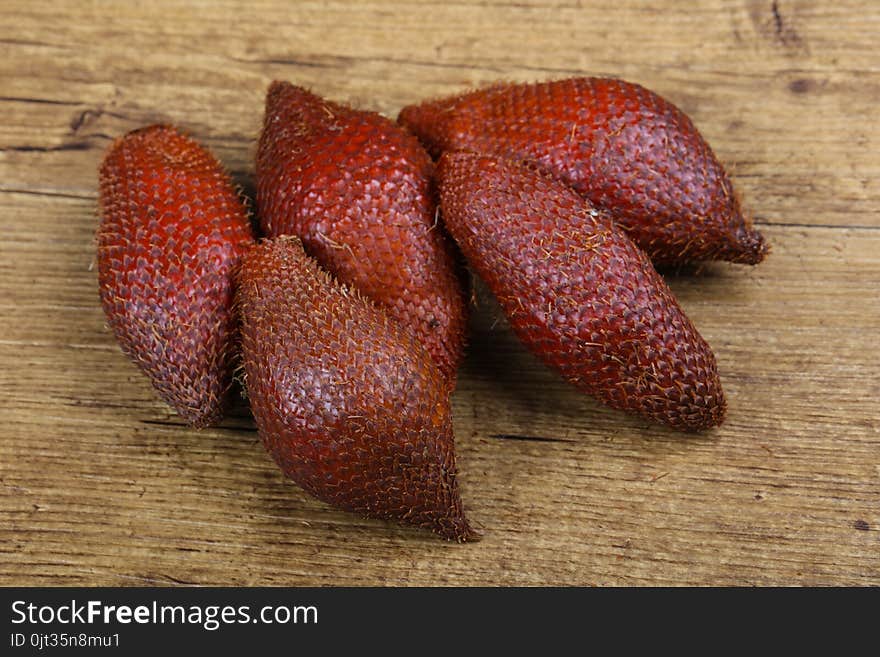 Asian fruit - sala on the wood background