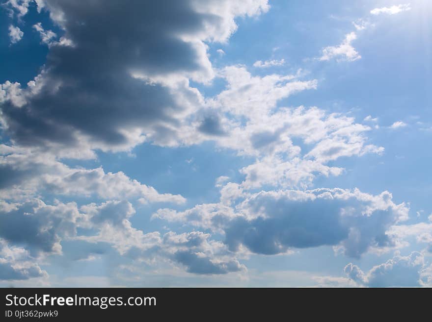 White Curly Clouds In A Blue Sky. Sky Background.