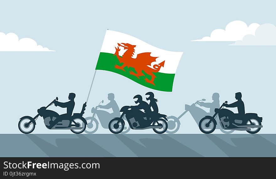 Bikers on motorcycles with wales flag