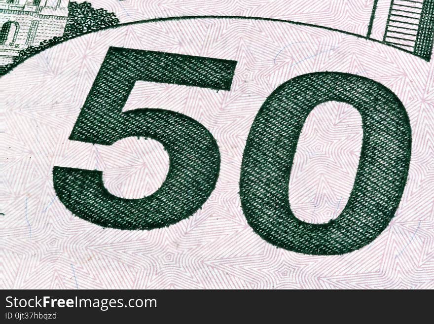 Detail of U.S. fifty dollar bill, isolated end stacked.