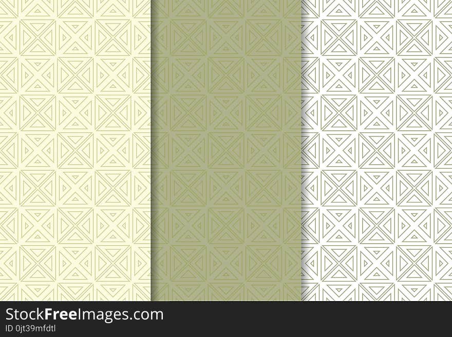 Olive green and white geometric ornaments. Set of seamless patterns