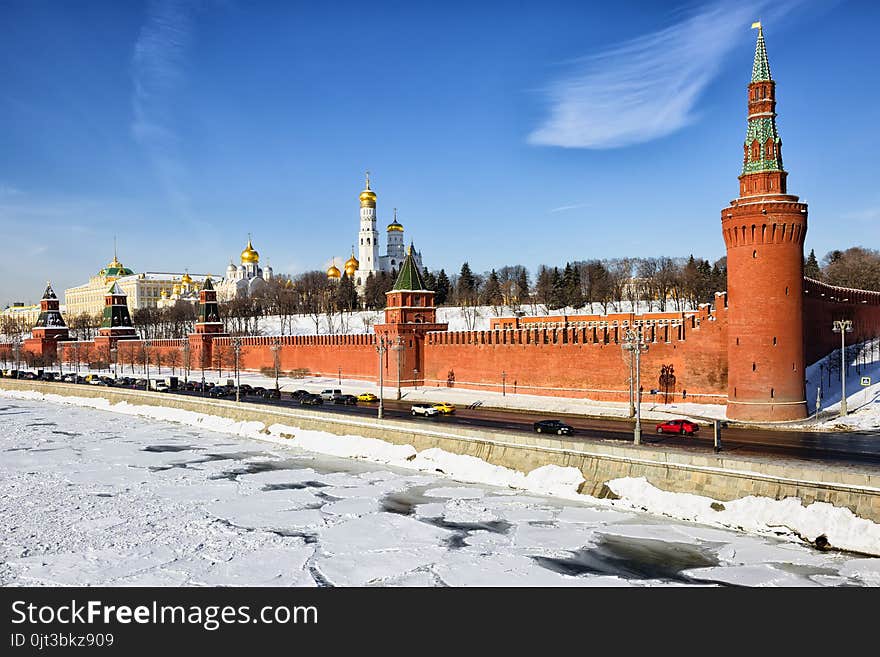 Kremlin embankment runs along the Moscow river past the southern wall of the Kremlin with seven towers. The Grand Kremlin Palace is a pearl of architecture, a historical monument. Kremlin embankment runs along the Moscow river past the southern wall of the Kremlin with seven towers. The Grand Kremlin Palace is a pearl of architecture, a historical monument.