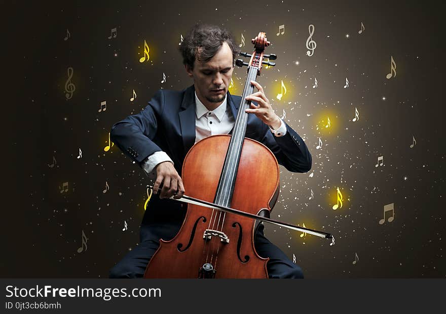 Young cellist with falling musical notes wallpaper and classical concept. Young cellist with falling musical notes wallpaper and classical concept