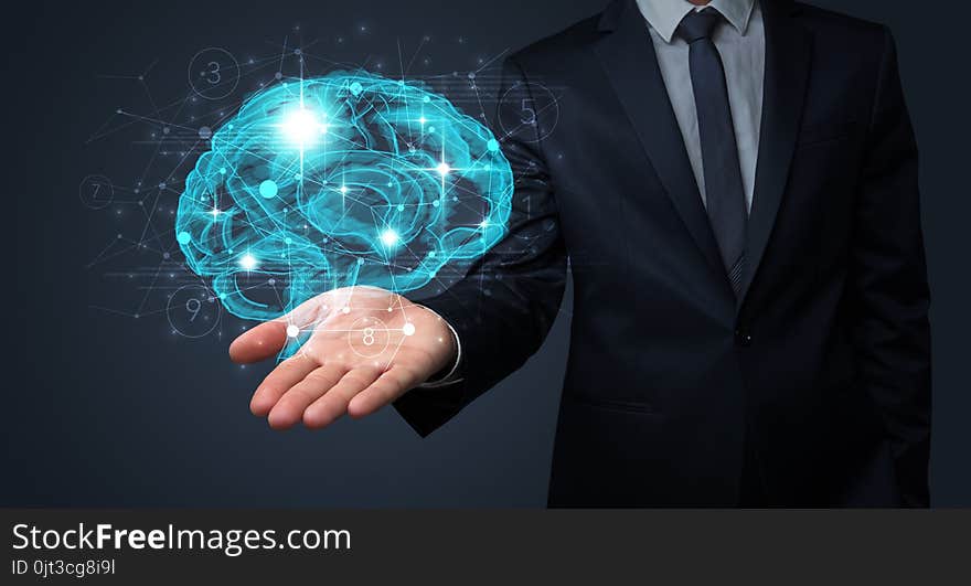 Man holding human brain on his hand