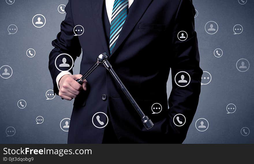 Handsome man standing with tool on his hand