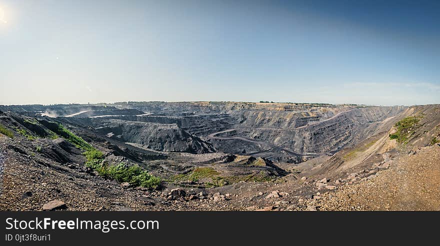 Territory of coal mining with traces of truck