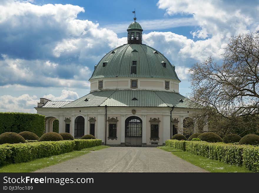 Flower gardens in french style and rotunda building in Kromeriz, Czech republic, Europe