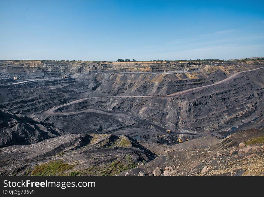 Territory of coal mining with traces of truck