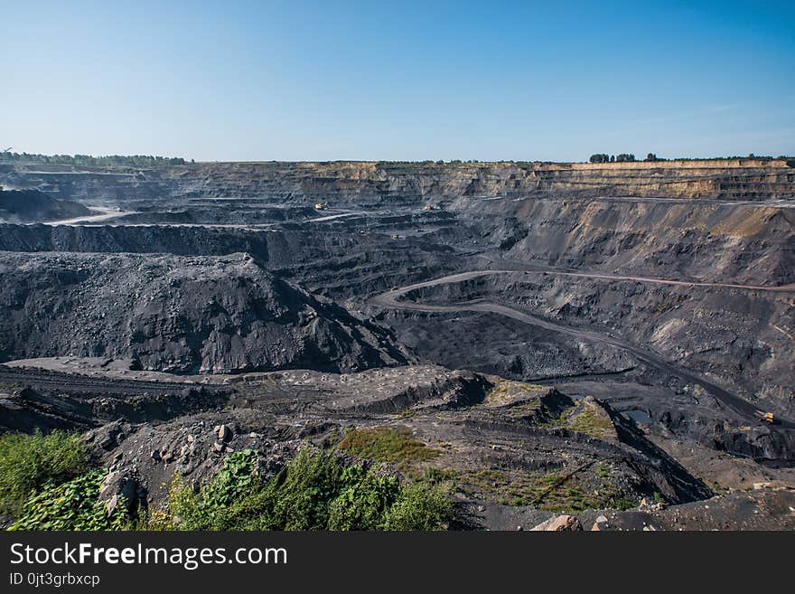 Territory of coal mining with traces of truck